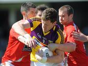 9 June 2013; Rory Quinlivan of Wexford in action against Paddy Keenan, right, and John Bingham of Louth during the Leinster GAA Football Senior Championship Quarter-Final between Louth and Wexford at the County Grounds in Drogheda, Louth. Photo by Dáire Brennan/Sportsfile