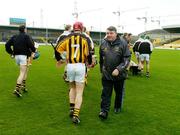 4 March 2007; Tipperary manager Michael 'Babs' Keating walks past the Kilkenny team as they assemble for the team photograph before the game. Allianz National Hurling League, Division 1B Round 2, Kilkenny v Tipperary, Nowlan Park, Kilkenny. Picture credit: Brendan Moran / SPORTSFILE