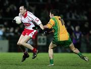 10 March 2007; Brian Dooher, Tyrone, in action against Johnny McLoone, Donegal. Allianz National Football League, Division 1A Round 4, Tyrone v Donegal, Healy Park, Omagh, Co. Tyrone. Picture credit: Oliver McVeigh / SPORTSFILE