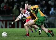10 March 2007; Brian Dooher, Tyrone, in action against Colm McFadden, Donegal. Allianz National Football League, Division 1A Round 4, Tyrone v Donegal, Healy Park, Omagh, Co. Tyrone. Picture credit: Oliver McVeigh / SPORTSFILE
