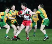 10 March 2007; Declan Treanor, Tyrone, in action against Brendan Devenney and Karl Lacey, Donegal. Allianz National Football League, Division 1A Round 4, Tyrone v Donegal, Healy Park, Omagh, Co. Tyrone. Picture credit: Oliver McVeigh / SPORTSFILE