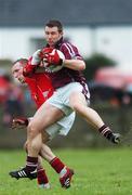 11 March 2007; Derek Heavin, Westmeath, in action against Christy Grimes, Louth. Allianz National Football League, Division 1B Round 4, Louth v Westmeath, St. Brigid's Park, Dowdallshill Dundalk, Co. Louth. Photo by Sportsfile