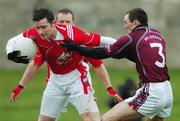 11 March 2007; Shane Lennon, Louth, in action against Michael Ennis, Westmeath. Allianz National Football League, Division 1B Round 4, Louth v Westmeath, St. Brigid's Park, Dowdallshill Dundalk, Co. Louth. Photo by Sportsfile