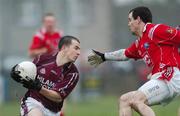 11 March 2007; Des Dolan, Westmeath, in action against Peter McGinnity, Louth. Allianz National Football League, Division 1B Round 4, Louth v Westmeath, St. Brigid's Park, Dowdallshill Dundalk, Co. Louth. Photo by Sportsfile