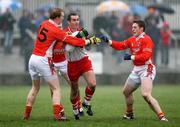 11 March 2007; Sean Martin Lockhart, Derry, in action against Paul Keenan and Charlie Vernon, Armagh. Allianz National Football League, Division 1B Round 4, Armagh v Derry, Oliver Plunkett Park, Crossmaglen, Co. Armagh. Picture credit: Oliver McVeigh / SPORTSFILE