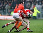 11 March 2007; Enda Muldoon, Derry, in action against Enda McNulty, Armagh. Allianz National Football League, Division 1B Round 4, Armagh v Derry, Oliver Plunkett Park, Crossmaglen, Co. Armagh. Picture credit: Oliver McVeigh / SPORTSFILE