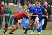 27 September 2014; Sean Masterson, Leinster, is tackled by David Gleeson, Munster. Under 18 Club Interprovincial, Munster v Leinster. Waterpark RFC, Waterford. Picture credit: Ramsey Cardy / SPORTSFILE