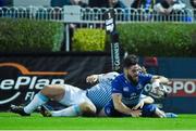 26 September 2014; Mick McGrath, Leinster, goes over to score his side's second try despite the tackle of Kristian Dacey, Cardiff Blues. Guinness PRO12, Round 4, Leinster v Cardiff Blues, RDS, Ballsbridge, Dublin. Picture credit: Ramsey Cardy / SPORTSFILE