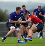 27 September 2014; Oisín Dowling, Leinster is tackled by Alex McHenry, Munster. Under 18 Schools Interprovincial, Munster v Leinster. CBC, Cork. Picture credit: Diarmuid Greene / SPORTSFILE