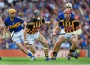 27 September 2014; Conor Fogarty, centre, Kilkenny, with support from team-mate Cillian Buckley in action against Shane McGrath, left, Tipperary. GAA Hurling All Ireland Senior Championship Final Replay, Kilkenny v Tipperary. Croke Park, Dublin. Picture credit: Brendan Moran / SPORTSFILE