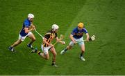 27 September 2014; Michael Fennelly, Kilkenny, in action against Patrick Maher, left, and Shane McGrath, Tipperary. GAA Hurling All Ireland Senior Championship Final Replay, Kilkenny v Tipperary. Croke Park, Dublin. Picture credit: Dáire Brennan / SPORTSFILE
