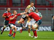 27 September 2014; Dan Biggar, Ospreys, is tackled by Paddy Butler, right, and Andrew Conway, Munster. Guinness PRO12, Round 4, Munster v Ospreys. Thomond Park, Limerick. Picture credit: Diarmuid Greene / SPORTSFILE