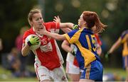 27 September 2014; Lisa Walsh, Kilkerrin Clonberne, Galway, in action against Sinéad O'Mahony, Parnells, London, during the Senior Championship final. 2014 TESCO HomeGrown All-Ireland Ladies Football Club Sevens Finals. Naomh Mearnóg GAA Club, Portmarnock, Co. Dublin. Picture credit: Barry Cregg / SPORTSFILE