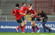 27 September 2014; Gerhard van den Heever, Munster, is congratulated by team-mates Ivan Dineen and Sean Dougall, left, after scoring his side's first try. Guinness PRO12, Round 4, Munster v Ospreys. Thomond Park, Limerick. Picture credit: Diarmuid Greene / SPORTSFILE