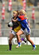 28 September 2014; Roisin Murphy, Wexford, in action against Laura Lee McCullagh, New York. TG4 All-Ireland Ladies Football Junior Championship Final, Wexford v New York. Croke Park, Dublin. Picture credit: Ramsey Cardy / SPORTSFILE