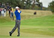28 September 2014; Rory McIlroy, Team Europe, watches his shot to the 2nd green during his Singles Match against Rickie Fowler, Team USA. The 2014 Ryder Cup, Final Day. Gleneagles, Scotland. Picture credit: Matt Browne / SPORTSFILE