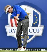 28 September 2014; Victor Dubuisson, Team Europe, hits his first tee shot of the day during his Singles Match against  Zach Johnson, Team USA. The 2014 Ryder Cup, Final Day. Gleneagles, Scotland. Picture credit: Matt Browne / SPORTSFILE