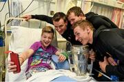 27 September 2014; Cian Kelly, aged 13, from Sallins, Co. Kildare, with Kilkenny players, from left, Kieran Joyce, Padraig Walsh and Killian Buckley. Victorious Kilkenny Champions visit Our Lady's Children Hospital. Our Lady's Children Hospital, Crumlin, Co Dublin. Picture credit: Pat Murphy / SPORTSFILE