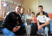 27 September 2014; Kilkenny's, from left, Cillian Buckley, Rackard Cody, and Michael Rice with Rebecca McKenna and Finn Thyssen. Victorious Kilkenny Champions visit Our Lady's Children Hospital. Our Lady's Children Hospital, Crumlin, Co Dublin. Picture credit: Pat Murphy / SPORTSFILE
