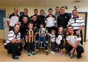 27 September 2014; Members of the victorious Kilkenny team meet with young children at Our Lady's Hospital for sick Children, Crumlin. Victorious Kilkenny Champions visit Our Lady's Children Hospital. Our Lady's Children Hospital, Crumlin, Co Dublin. Picture credit: Pat Murphy / SPORTSFILE