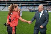 28 September 2014; Pat Quill, President of the Ladies Gaelic Football Association, shakes the hand of Down captain Niamh McGowan ahead of the game. TG4 All-Ireland Ladies Football Intermediate Championship Final, Down v Fermanagh. Croke Park, Dublin. Picture credit: Ramsey Cardy / SPORTSFILE