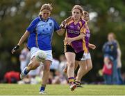 27 September 2014; Maria Lee, Europe, in action against, Sarah Cearns, St. Lawrences, Lancashire. 2014 TESCO HomeGrown All-Ireland Ladies Football Club Sevens Finals. Naomh Mearnóg GAA Club, Portmarnock, Co. Dublin. Picture credit: Barry Cregg / SPORTSFILE