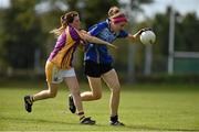 27 September 2014; Maria Corrochano Ibdnez, Europe, in action against, Cathy O'Reilly, St. Lawrences, Lancashire. 2014 TESCO HomeGrown All-Ireland Ladies Football Club Sevens Finals. Naomh Mearnóg GAA Club, Portmarnock, Co. Dublin. Picture credit: Barry Cregg / SPORTSFILE