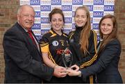 27 September 2014; Laura McEnaney, left, and Kate Brennan, Corduff, Monaghan, receive the Intermediate Shield Runners Up award from Pat Quill, President, Ladies Gaelic Football Association, and Lynn Moynihan, Local Marketing Manager, Tesco Ireland. 2014 TESCO HomeGrown All-Ireland Ladies Football Club Sevens Finals. Naomh Mearnóg GAA Club, Portmarnock, Co. Dublin. Picture credit: Barry Cregg / SPORTSFILE