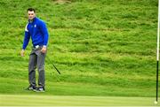 28 September 2014; Martin Kaymer, Team Europe, watches his pitch on the 16th green go into the hole to win the his Singles Match against Bubba Watson, Team USA. The 2014 Ryder Cup, Final Day. Gleneagles, Scotland. Picture credit: Matt Browne / SPORTSFILE