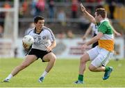 28 September 2014; Ronan O'Neill,  Omagh St. Enda’s, in action against Michael Donaghy, Carrickmore Naomh Colmcille. Tyrone County Senior Football Championship Final, Carrickmore Naomh Colmcille v Omagh St. Enda’s, Healy Park, Omagh, Co. Tyrone. Picture credit: Oliver McVeigh / SPORTSFILE