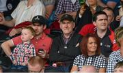 28 September 2014; Tyrone manager Mickey Harte, centre, with his sons Matthew, left, and Mark, right, watch the game from the stand. Tyrone County Senior Football Championship Final, Carrickmore Naomh Colmcille v Omagh St. Enda’s, Healy Park, Omagh, Co. Tyrone. Picture credit: Oliver McVeigh / SPORTSFILE