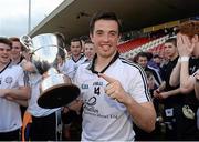 28 September 2014; Ronan O'Neill, Omagh St. Enda’s, who scored his side's winning goal in additional time, celebrates with the O'Neill cup. Tyrone County Senior Football Championship Final, Carrickmore Naomh Colmcille v Omagh St. Enda’s, Healy Park, Omagh, Co. Tyrone. Picture credit: Oliver McVeigh / SPORTSFILE