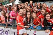 28 September 2014; Cork's Bríd Stack with supporters after the game. TG4 All-Ireland Ladies Football Senior Championship Final, Cork v Dublin. Croke Park, Dublin. Picture credit: Ramsey Cardy / SPORTSFILE