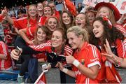 28 September 2014; A supporter takes a 'selife' with Cork's Bríd Stack after the game. TG4 All-Ireland Ladies Football Senior Championship Final, Cork v Dublin. Croke Park, Dublin. Picture credit: Ramsey Cardy / SPORTSFILE