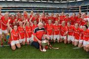 28 September 2014; Cork manager Eamon Ryan and the team celebrate with the Brendan Martin Cup after the game. TG4 All-Ireland Ladies Football Senior Championship Final, Cork v Dublin. Croke Park, Dublin. Picture credit: Brendan Moran / SPORTSFILE
