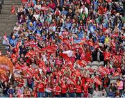 28 September 2014; Cork supporters, in the Cusack Stand, celebrate a score. TG4 All-Ireland Ladies Football Senior Championship Final, Cork v Dublin. Croke Park, Dublin. Picture credit: Ray McManus / SPORTSFILE