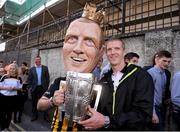 27 September 2014; Kilkenny supporter Conor Dwyer wearing a Henry Shefflin mask holds the Liam MacCarthy Cup with Kilkenny's Henry Shefflin during the homecoming celebrations. All Ireland Hurling Champions return to Kilkenny. Kilkenny Picture credit: Pat Murphy / SPORTSFILE
