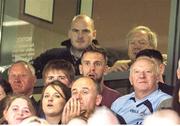 28 September 2014; Dublin senior men's footballer Jonny Cooper, centre, watches the game. TG4 All-Ireland Ladies Football Senior Championship Final, Cork v Dublin. Croke Park, Dublin. Picture credit: Brendan Moran / SPORTSFILE