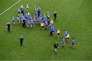 28 September 2014; Dublin manager Gregory McGonigle, his players and support staff, leave the field after the presentation to Cork. TG4 All-Ireland Ladies Football Senior Championship Final, Cork v Dublin. Croke Park, Dublin. Picture credit: Ray McManus / SPORTSFILE
