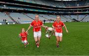 28 September 2014; Cork captain Briege Corkery, centre, with her sister Mairead, right, and their niece Bridgín, with the Brendan Martin Cup. TG4 All-Ireland Ladies Football Senior Championship Final, Cork v Dublin. Croke Park, Dublin. Picture credit: Brendan Moran / SPORTSFILE
