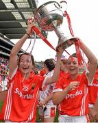 28 September 2014; Cork's Eimear Scally, left, and Orlagh Farmer celebrate with the Brendan Martin Cup after the game. TG4 All-Ireland Ladies Football Senior Championship Final, Cork v Dublin. Croke Park, Dublin. Picture credit: Brendan Moran / SPORTSFILE
