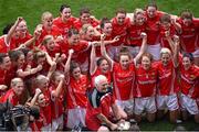 28 September 2014; Members of the Cork squad and manager Eamonn Ryan celebrate after the presentation. TG4 All-Ireland Ladies Football Senior Championship Final, Cork v Dublin. Croke Park, Dublin. Picture credit: Ray McManus / SPORTSFILE