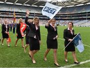 28 September 2014; Members of the Ireland Women's rugby team, from left, Jenny Murphy, Fiona Coghlan and Lynne Cantwell, are introduced to the crowd at half-time. TG4 All-Ireland Ladies Football Senior Championship Final, Cork v Dublin. Croke Park, Dublin. Picture credit: Ramsey Cardy / SPORTSFILE