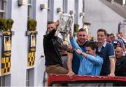 27 September 2014; Kilkenny players, from left, Lester Ryan, Conor Fogarty, TJ Reid and Matthew Ruth with the Liam MacCarthy Cup as the team bus makes its way to Nowlan Park during the homecoming celebrations. All Ireland Hurling Champions return to Kilkenny. Kilkenny Picture credit: Pat Murphy / SPORTSFILE