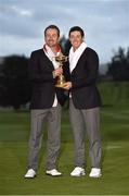 28 September 2014; European team players Graeme McDowell, left, and Rory McIlroy celebrate with the Ryder Cup. The 2014 Ryder Cup, Final Day. Gleneagles, Scotland. Picture credit: Matt Browne / SPORTSFILE