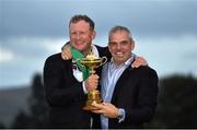 28 September 2014; European team captain Paul McGinley and Jamie Donaldson celebrate with the Ryder Cup. The 2014 Ryder Cup, Final Day. Gleneagles, Scotland. Picture credit: Matt Browne / SPORTSFILE