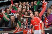 28 September 2014; Cork's Geraldine O'Flynn with supporters after the game. TG4 All-Ireland Ladies Football Senior Championship Final, Cork v Dublin. Croke Park, Dublin. Picture credit: Ramsey Cardy / SPORTSFILE
