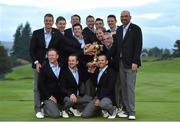 28 September 2014; The European Ryder Cup team, back row, from left, Henrik Stenson, Stephen Gallacher, Lee Westwood, Rory McIlroy, Ian Poulter, Martin Kaymer, Victor Dubuisson, captain Paul McGinley, Justin Rose, and Thomas Björn. Front row, from left, Jamie Donaldson, Graeme McDowell and Sergio Garcia celebrate with the Ryder Cup. The 2014 Ryder Cup, Final Day. Gleneagles, Scotland. Picture credit: Matt Browne / SPORTSFILE