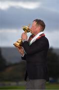 28 September 2014; Jamie Donaldson celebrates with the Ryder Cup. The 2014 Ryder Cup, Final Day. Gleneagles, Scotland. Picture credit: Matt Browne / SPORTSFILE