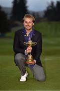 28 September 2014; Victor Dubuisson, Team Europe, with the Ryder Cup. The 2014 Ryder Cup, Final Day. Gleneagles, Scotland. Picture credit: Matt Browne / SPORTSFILE